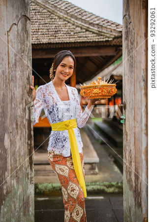 beautiful balinese woman wearing traditional clothes in the village beautiful balinese woman wearing traditional clothes in the village 93292061