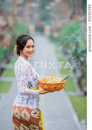 beautiful balinese woman wearing kebaya in the penglipuran bali village 93292393