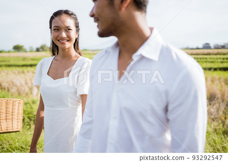 couple holding hand enjoy their time together outdoor 93292547
