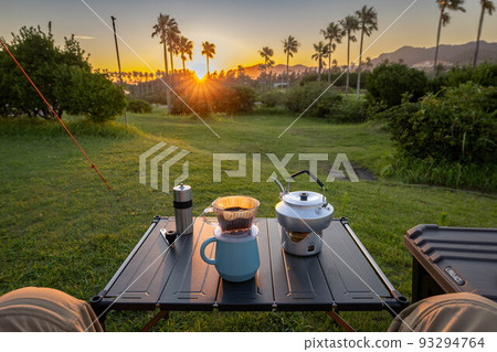 coffee while watching the sunset 93294764