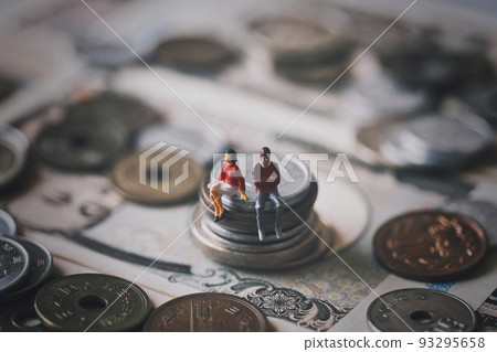 Money and miniature men and women Money and miniature men and women 93295658