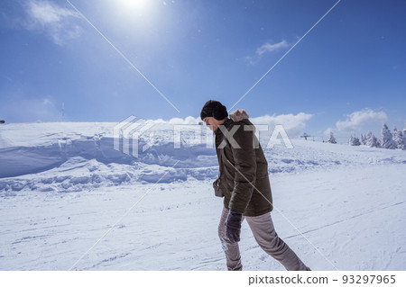 man walking on top of the snowy mountain in bursa turkey man walking on top of the snowy mountain in bursa turkey 93297965