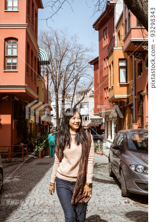 beautiful woman walking in kuzguncuk istanbul turkey 93298343