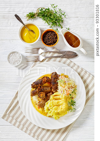 beef rouladen with potato mash and sauerkraut beef rouladen with potato mash and sauerkraut 93301816