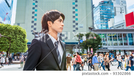 A refreshing young businessman scrambled intersection 93302866