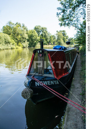 Boats moored on the River Thames in Old Windsor outside London 93305379