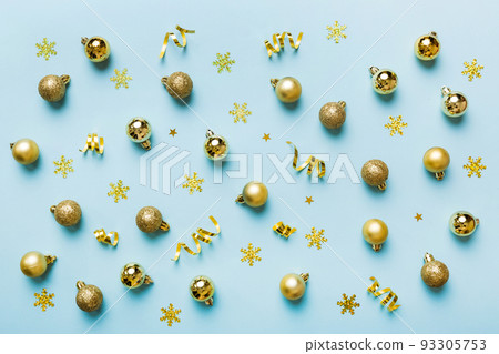 Christmas composition. a pattern of christmas balls on colored background. Flat lay, top view New year decor Christmas composition. a pattern of christmas balls on colored background. Flat lay, top view New year decor 93305753