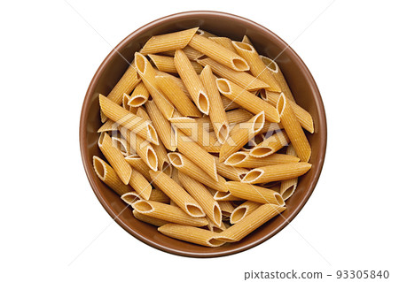 Whole Grain penne pasta from durum wheat in bowl isolated on white background. 93305840