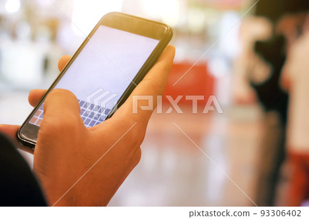 man checking his phone man checking his phone 93306402