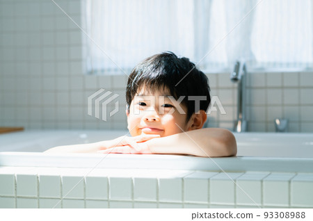Boy taking a bath 93308988