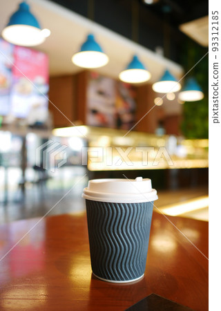 take away paper coffee cup o on cafe table take away paper coffee cup o on cafe table 93312185