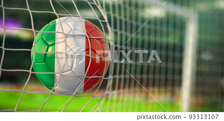 Football ball with flag of Italy in the net of goal of football stadium. Football championship of Italy concept. Football ball with flag of Italy in the net of goal of football stadium. Football championship of Italy concept. 93313107