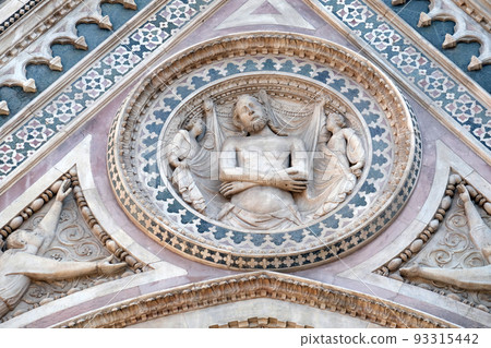 Wrapping Christ in his shroud, Portal on the side-wall of Cattedrale di Santa Maria del Fiore (Cathedral of Saint Mary of the Flower), Florence, Italy Wrapping Christ in his shroud, Portal on the side-wall of Cattedrale di Santa Maria del Fiore (Cathedral of Saint Mary of the Flower), Florence, Italy 93315442