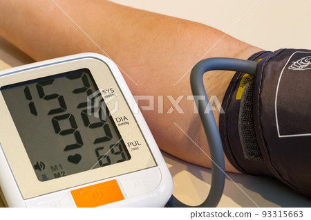 Measuring blood pressure close-up. Too high blood pressure. Measuring blood pressure close-up. Too high blood pressure. 93315663