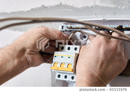 Electrical work to install new panel of electric distribution board consumer unit with fuse box or circuit breaker 93315976