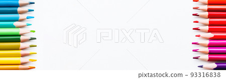 Rows of colored pencils on white background. School supplies with copy space on white background. Top view on kid's stationery. Back to school backdrop. 93316838