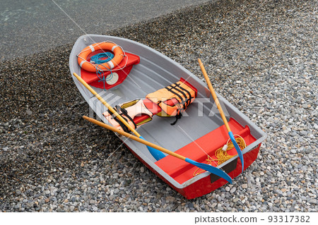 Rescue boat on the shore. 93317382