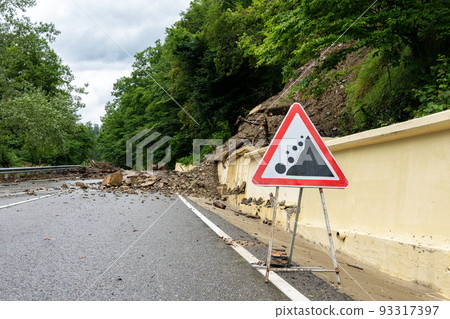 Automobile sign of falling stones. Watch out for rockfall. Rockfall danger. Automobile sign of falling stones. Watch out for rockfall. Rockfall danger. 93317397