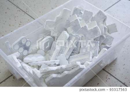 Detail objects printed on powder 3D printer and covered white polyamide powder close-up. Technology Multi Jet Fusion MJF. 3D prototype models created by new additive progressive 3d printing technology 93317563