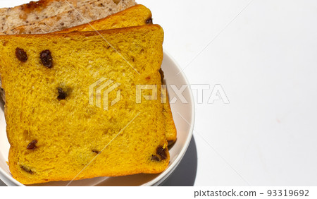 Stack of bread slices with whole grains 93319692