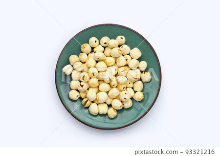 Dried lotus seeds on white background. 93321216