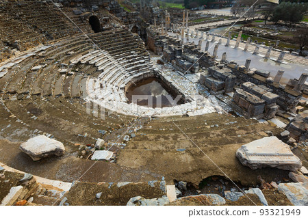 Ruins of the Upper Agora at Ephesus ancient site in Turkey. View of fragments of columns, with Sacred Street and Odeon 93321949