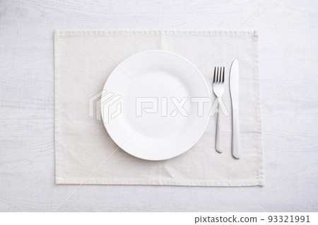 Simple white plate, fork and knife 93321991