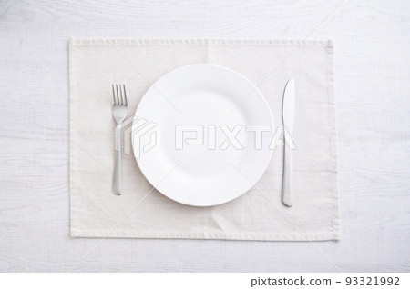 Simple white plate, fork and knife Simple white plate, fork and knife 93321992