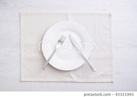Simple white plate, fork and knife 93321993