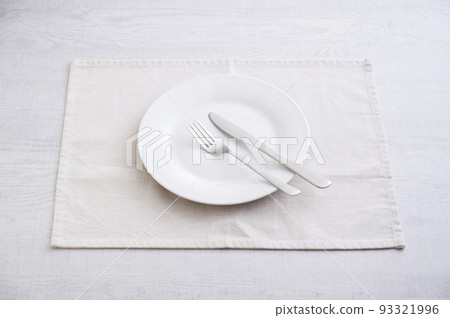 Simple white plate, fork and knife 93321996