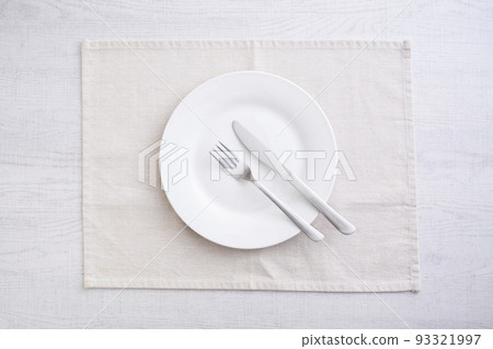Simple white plate, fork and knife 93321997