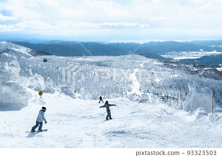 Snow covered trees and ski slopes of Zao, the silver world of Yamagata Snow covered trees and ski slopes of Zao, the silver world of Yamagata 93323503