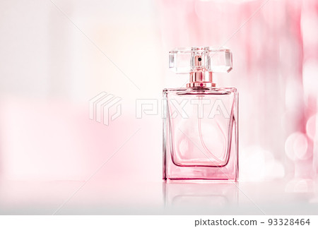 Perfume bottle on glamour background, floral feminine scent, fragrance and eau de parfum as luxury holiday gift, cosmetic and beauty brand present concept 93328464