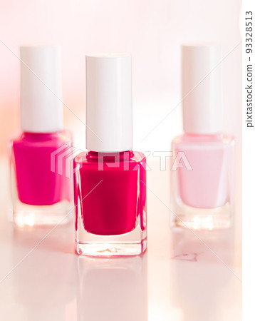 Shades of pink and red nail polish set on glamour background, nailpolish bottles for manicure and pedicure, luxury beauty cosmetics and make-up brand ad 93328513