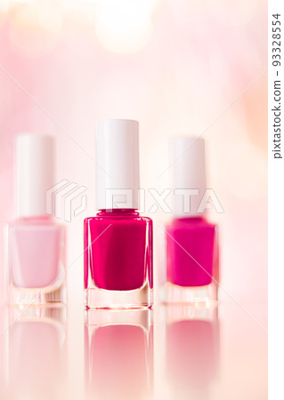 Shades of pink and red nail polish set on glamour background, nailpolish bottles for manicure and pedicure, luxury beauty cosmetics and make-up brand ad Shades of pink and red nail polish set on glamour background, nailpolish bottles for manicure and pedicure, luxury beauty cosmetics and make-up brand ad 93328554