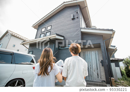A couple / family who built a new home A couple / family who built a new home 93330221