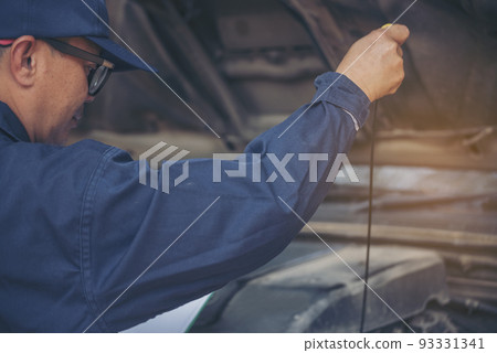 Mechanic car service auto garage in automotive mobile center. Technician workshop repair engine motor vehicles service mechanical engineering business. Automobile mechanic hands car repairs technic Mechanic car service auto garage in automotive mobile center. Technician workshop repair engine motor vehicles service mechanical engineering business. Automobile mechanic hands car repairs technic 93331341