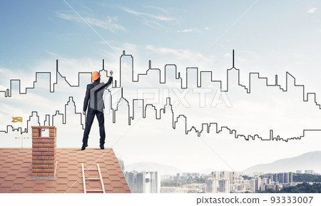 Man architect draw silhouette of modern city on blue sky. Mixed Man architect draw silhouette of modern city on blue sky. Mixed 93333007
