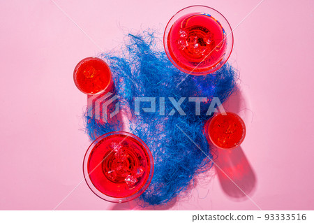 Pink summer cocktails on color background close up 93333516