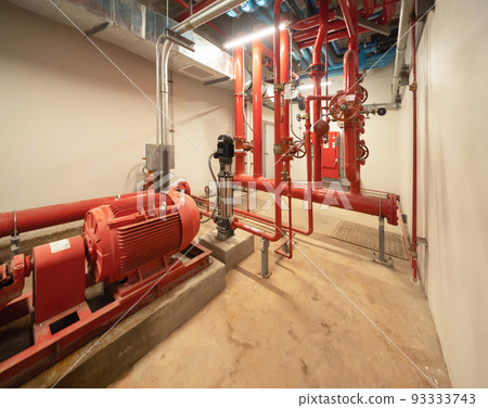Industry factory. Chiller tower on rooftop building. Fire protection system work machine. Condenser Water Supply pipe lines. Workshop site. 93333743