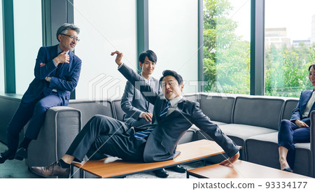 Businessman dancing in the office Businessman dancing in the office 93334177
