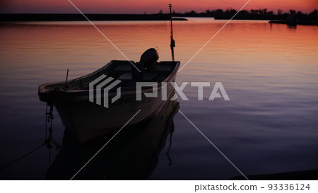 Hisamatsu fishing port and boats dyed red in the sunset Miyakojima, a remote island in Okinawa Prefecture Hisamatsu fishing port and boats dyed red in the sunset Miyakojima, a remote island in Okinawa Prefecture 93336124