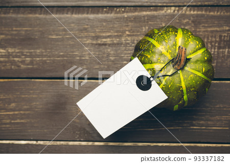 Pumpkin on old rustic wooden table. Pumpkin on old rustic wooden table. 93337182