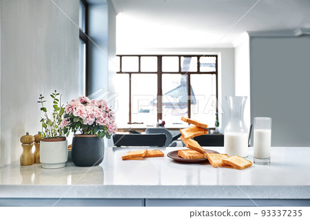 Flying toasts for breakfast and a glass of milk drink. Levitation food and healthy breakfast concept. Flying toasts for breakfast and a glass of milk drink. Levitation food and healthy breakfast concept. 93337235