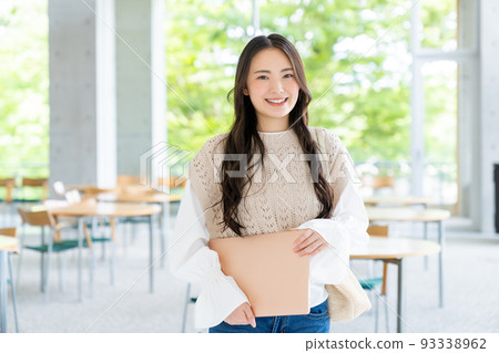 College girl with a computer College girl with a computer 93338962