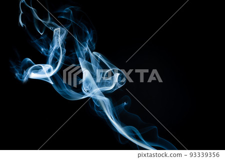 Abstract shape of colored Smoke on a black background. Abstract shape of colored Smoke on a black background. 93339356