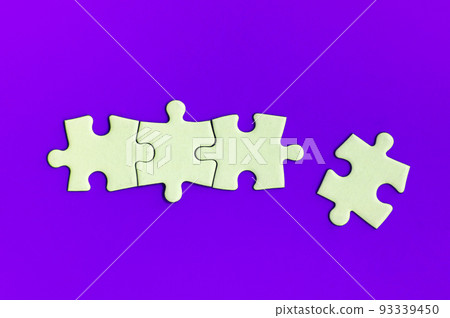 Jigsaw puzzle on purple background with customizable space for text or ideas. Copy space Jigsaw puzzle on purple background with customizable space for text or ideas. Copy space 93339450