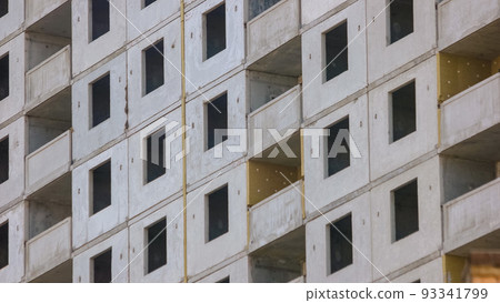 New skyscraper building under construction. Building without windows. 93341799