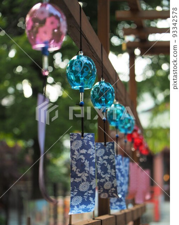 Wind chimes at dusk (vertical) 93342578