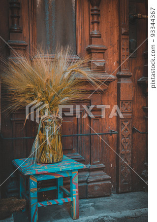 Rural decoration of front door. Cozy vintage thing 93344367